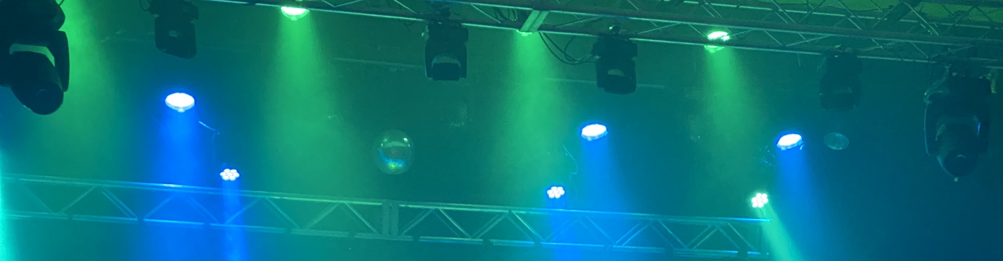 blue and green theater stage lights Syracuse